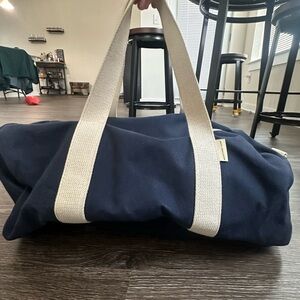 Jack & Mulligan navy blue and white small duffle bag